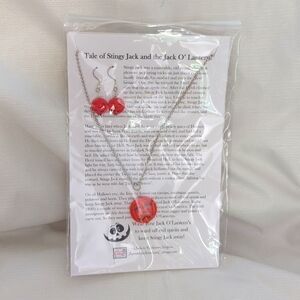 Brand new with tags Halloween jack-o'-lantern earring and necklace set